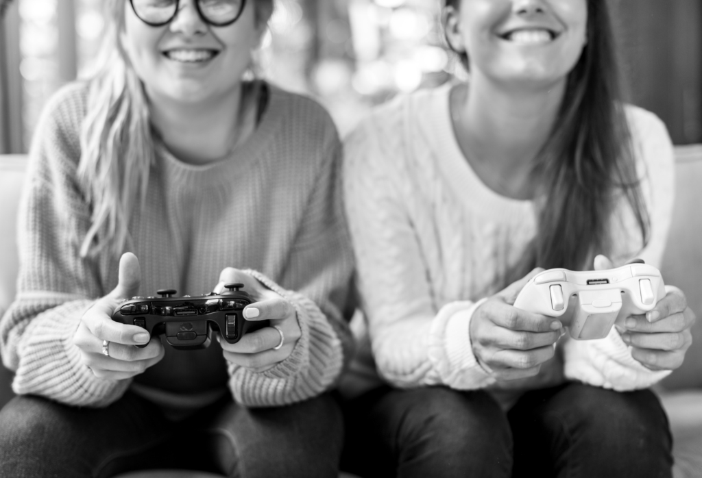 Women playing video game together